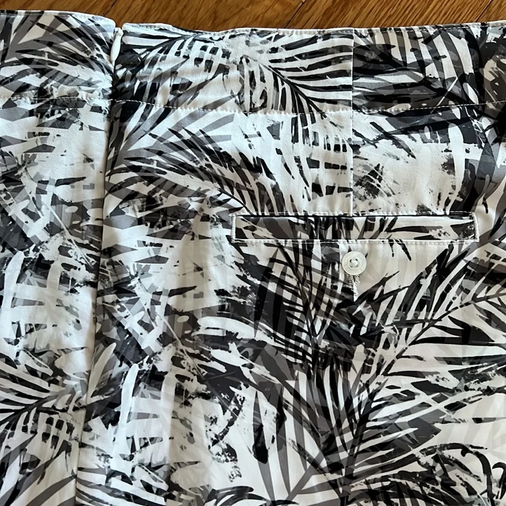 ONE BRAND NEW SKORT AND ONE PAIR OF SHORTS - Picture 6 of 9